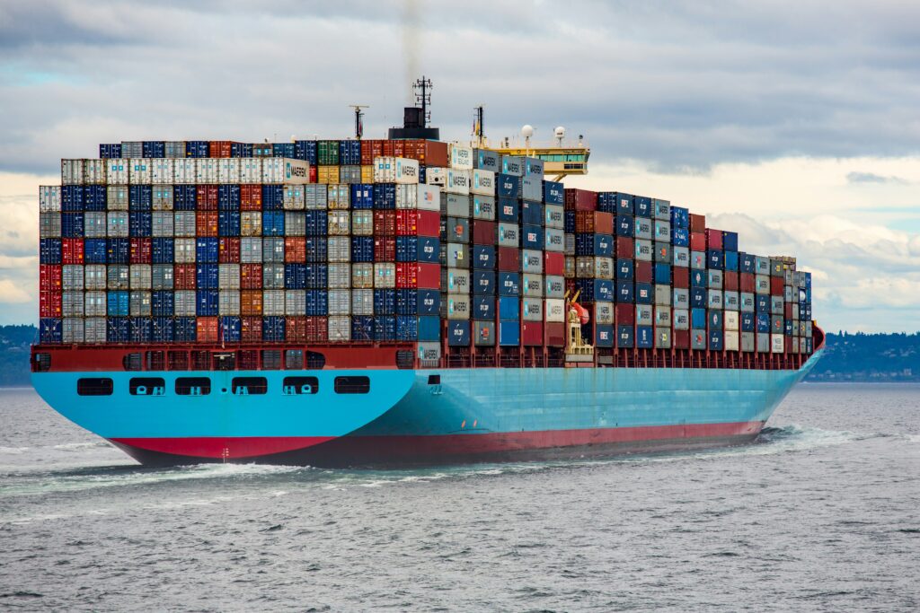 Large ocean freight vessel loaded with stacked containers for cost-effective sea freight.