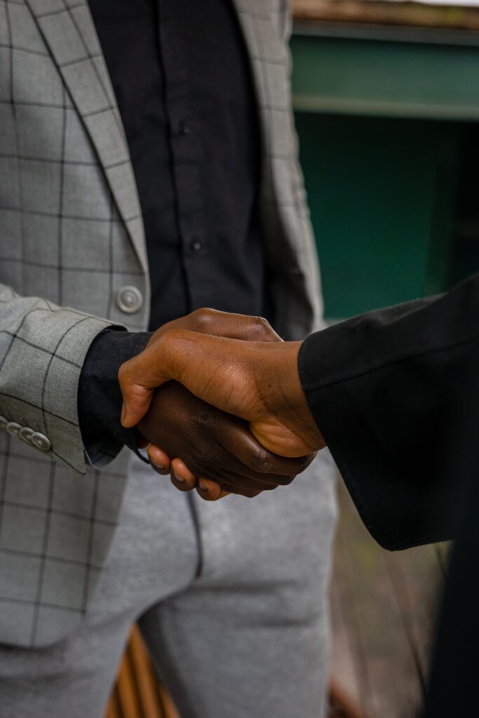 Corporate handshake sealing a streamlined global B2B procurement partnership for international business needs.